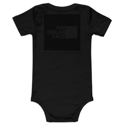 BABY One Piece - THE QIBLAH FACE (Never Stop Praying - Back Logo) - Black